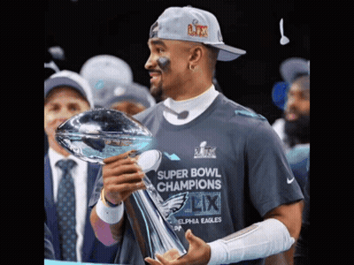 Woman In NY Hat On Man's Shoulders GIF
