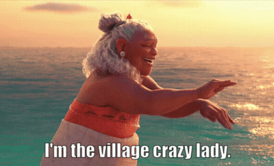 Woman In Ocean Saying I'm The Village Crazy Lady GIF