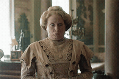 Woman In Old Fashioned Dress Making Face GIF