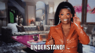 Woman In Orange Jacket Says Understand GIF