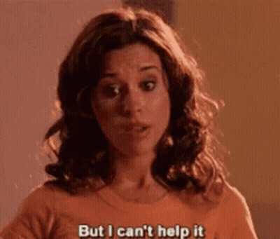 Woman In Orange Shirt Saying But I Cant Help It GIF