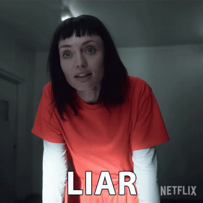 Woman In Orange Shirt Saying Liar GIF