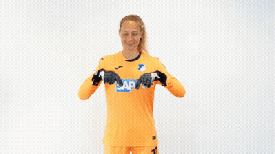 Woman In Orange Shirt With Sap GIF