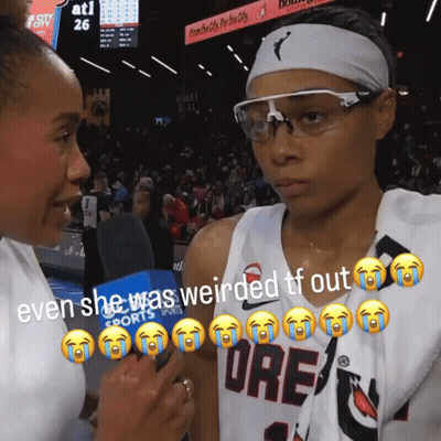Woman in Ore Jersey Interviewed by Reporter