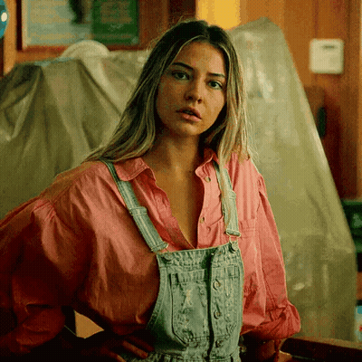 Woman In Overalls And Pink Shirt GIF