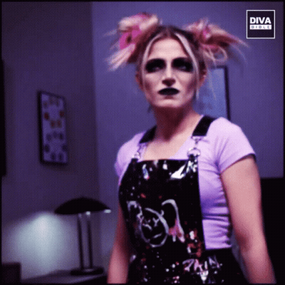 Woman In Overalls And Purple Shirt With Diva Girls GIF