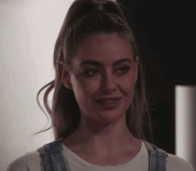 Woman In Overalls Smiling GIF