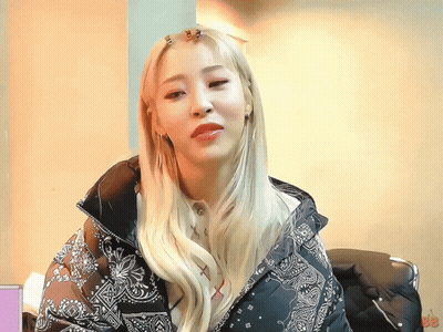 Woman In Paisley Black Jacket GIF