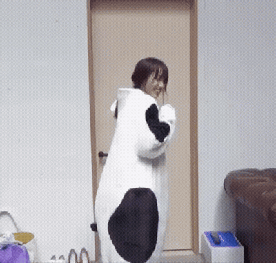 Woman In Panda Costume At Doorway GIF
