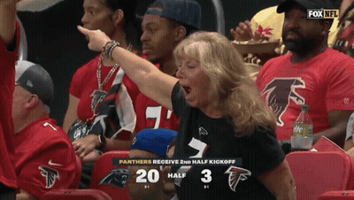 Woman in Panthers Shirt Screaming in Stands