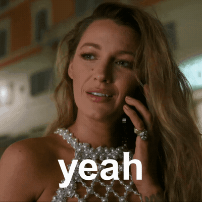 Woman In Pearl Necklace Talking On Cell Phone Saying Yeah GIF