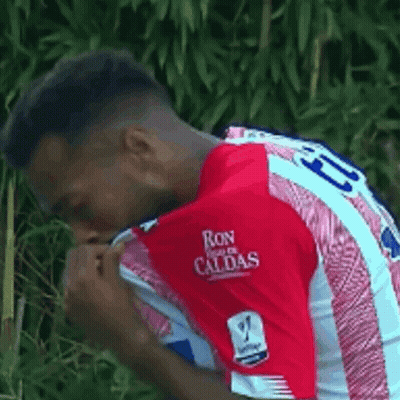 Woman In Pink And Green Outfit Laying Down JTV Live GIF