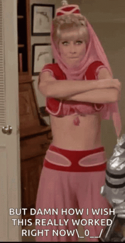Woman In Pink And Red Costume With Crossed Arms GIF
