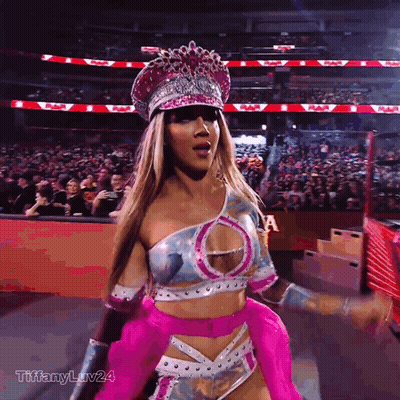 Woman in Pink and Silver Outfit With Hashtag Tiffanyluv24
