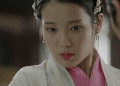 Woman In Pink And White Outfit Close Up GIF