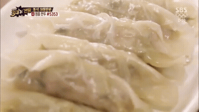Woman In Pink Apron Preparing Food In Kitchen GIF