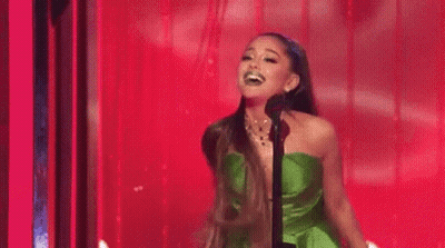Woman In Pink Beside Woman In Blue GIF