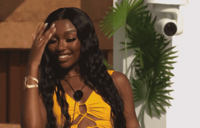 Woman In Pink Bikini On Couch With Itv 2 GIF