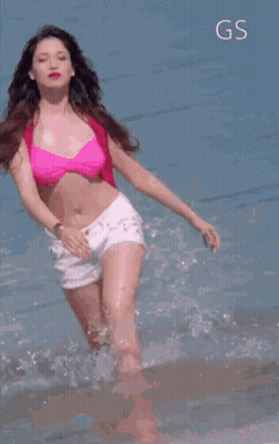 Woman In Pink Bikini Running In Ocean GIF