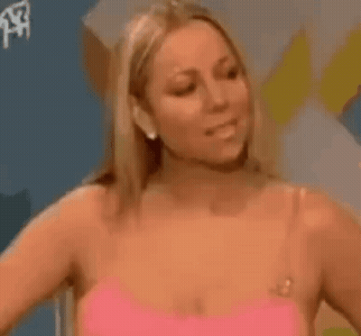 Woman In Pink Bra Holding Hair GIF