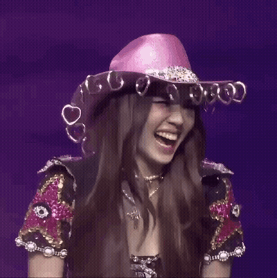 Woman In Pink Cowboy Hat With Hearts GIF