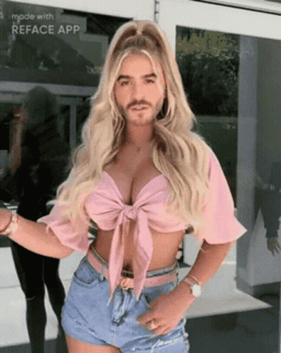 Woman In Pink Crop Top And Denim Shorts With Man Face On Her Face GIF
