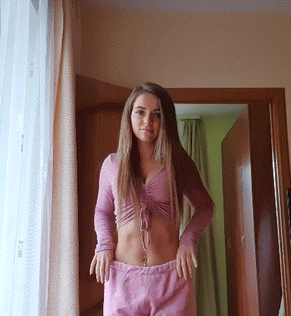 Woman In Pink Crop Top And Shorts GIF