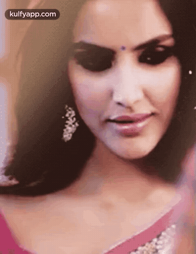 Woman In Pink Dress And Earrings GIF