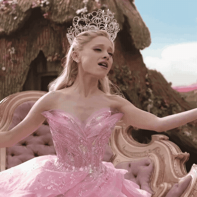 Woman In Pink Dress And Tiara Singing GIF
