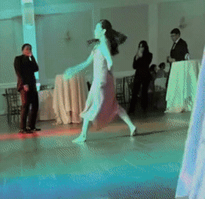 Woman in Pink Dress Dancing
