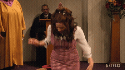 Woman In Pink Dress Dancing In Church With Netflix Logo GIF