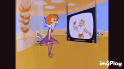 Woman In Pink Dress Dancing In Front Of TV GIF