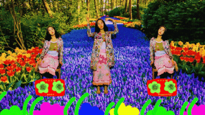 Woman In Pink Dress Dancing With Boombox In Flowers GIF