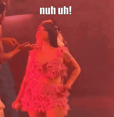Woman In Pink Dress Dancing With Man Behind GIF