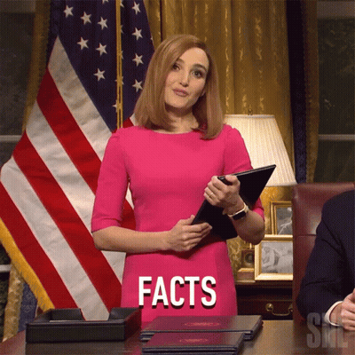 Woman In Pink Dress Holding Clipboard With Facts GIF