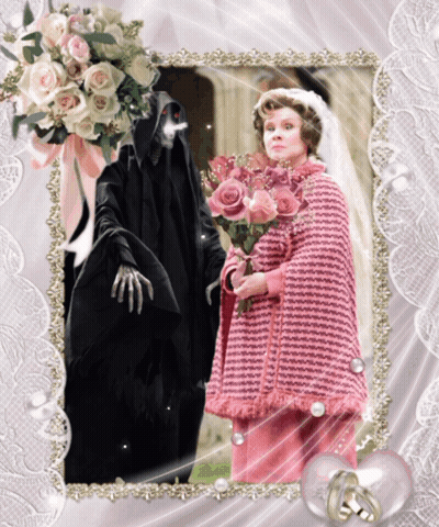 Woman In Pink Dress Holding Pink Roses GIF