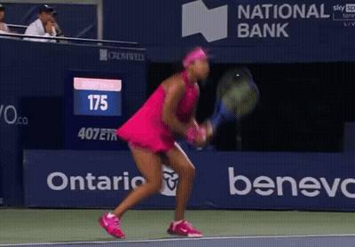 Woman In Pink Dress Holding Tennis Racquet GIF