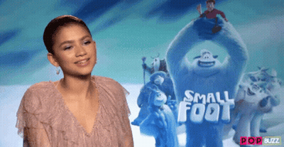 Woman In Pink Dress In Front Of Foot Poster GIF