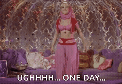 Woman In Pink Dress Laying On Purple Couch Saying One Day GIF