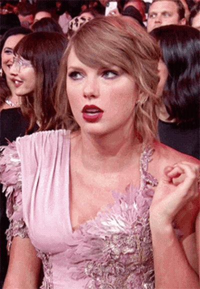 Woman In Pink Dress Looking GIF
