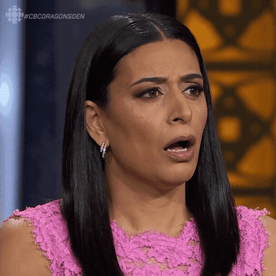 Woman In Pink Dress Making Funny Face GIF