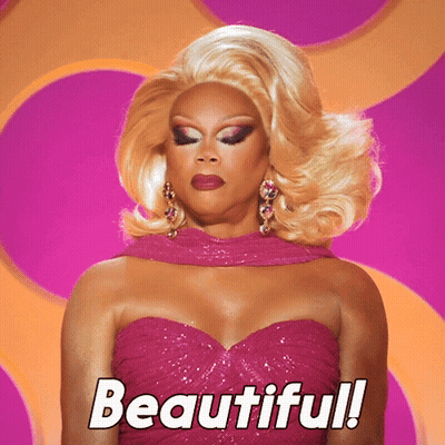 Woman In Pink Dress Saying Beautiful GIF