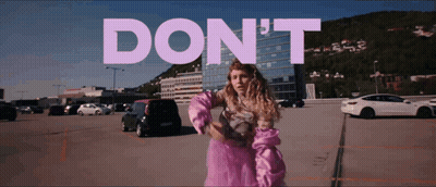 Woman In Pink Dress Saying Don't GIF