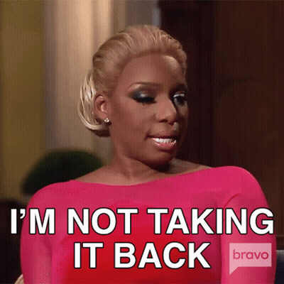 Woman In Pink Dress Saying I'm Not Taking It Back GIF