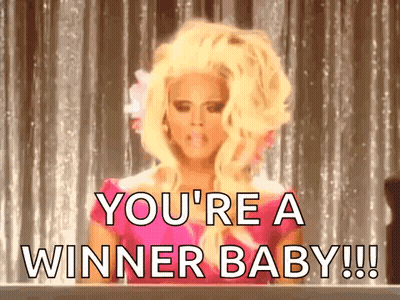 Woman In Pink Dress Saying Youre A Winner Baby GIF