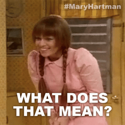 Woman In Pink Dress Smiling What Does That Mean GIF