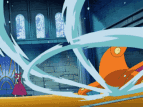 Woman In Pink Dress Standing In Front Of Large Orange Object GIF