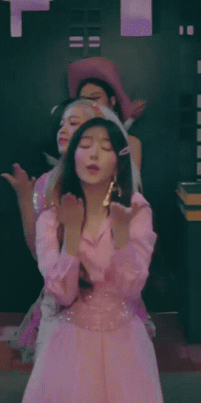Woman In Pink Dress Standing With Others GIF