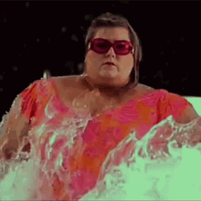 Woman In Pink Dress Swimming GIF