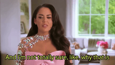 Woman In Pink Dress Talking GIF